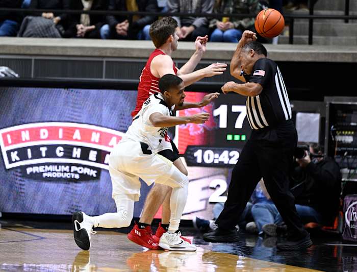 Isaiah Thompson goes for the loose ball.